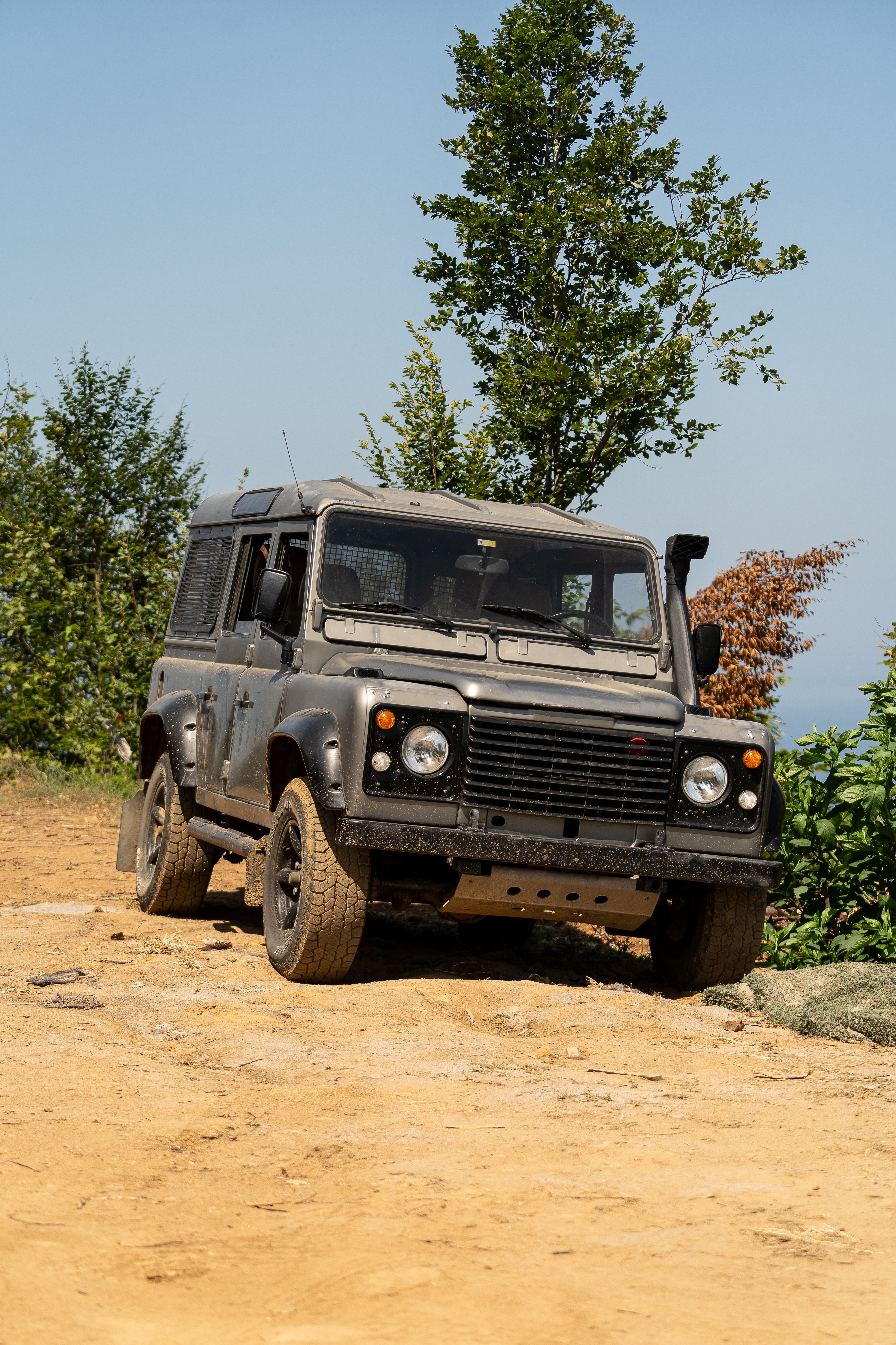 Defender working through rough terrain